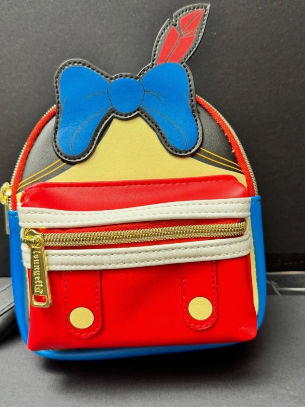 Loungefly Disney Pinocchio Figural Wristlet Exclusive Red Blue Bow